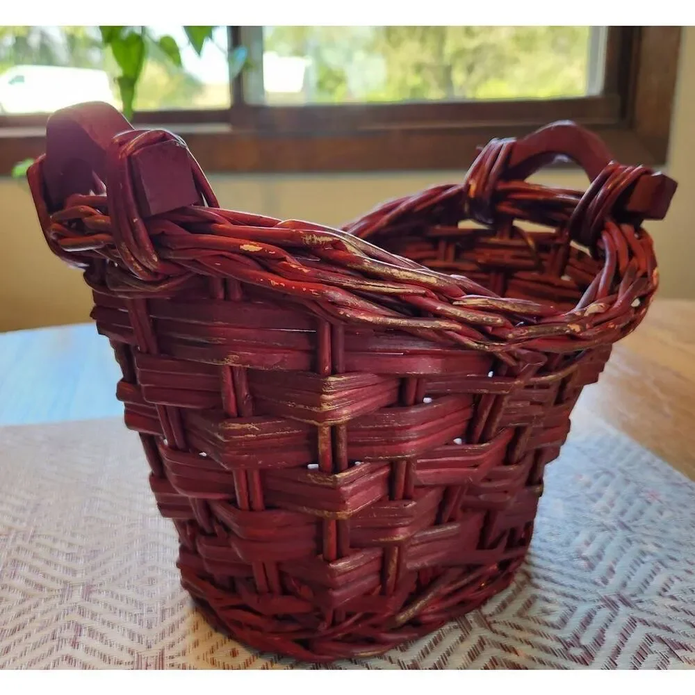 Red basket with wood handles